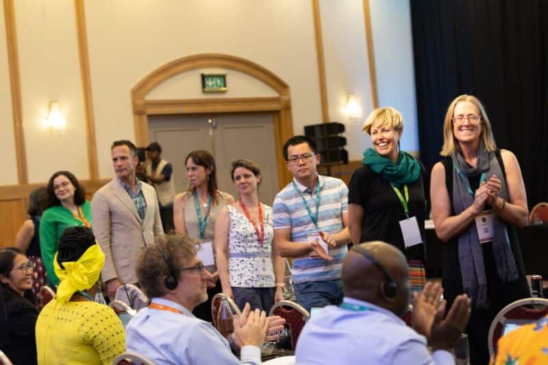 Delegates applaud the Coordinating Lead Authors as the Transformative Change Assessment text is adopted 16 December 2024